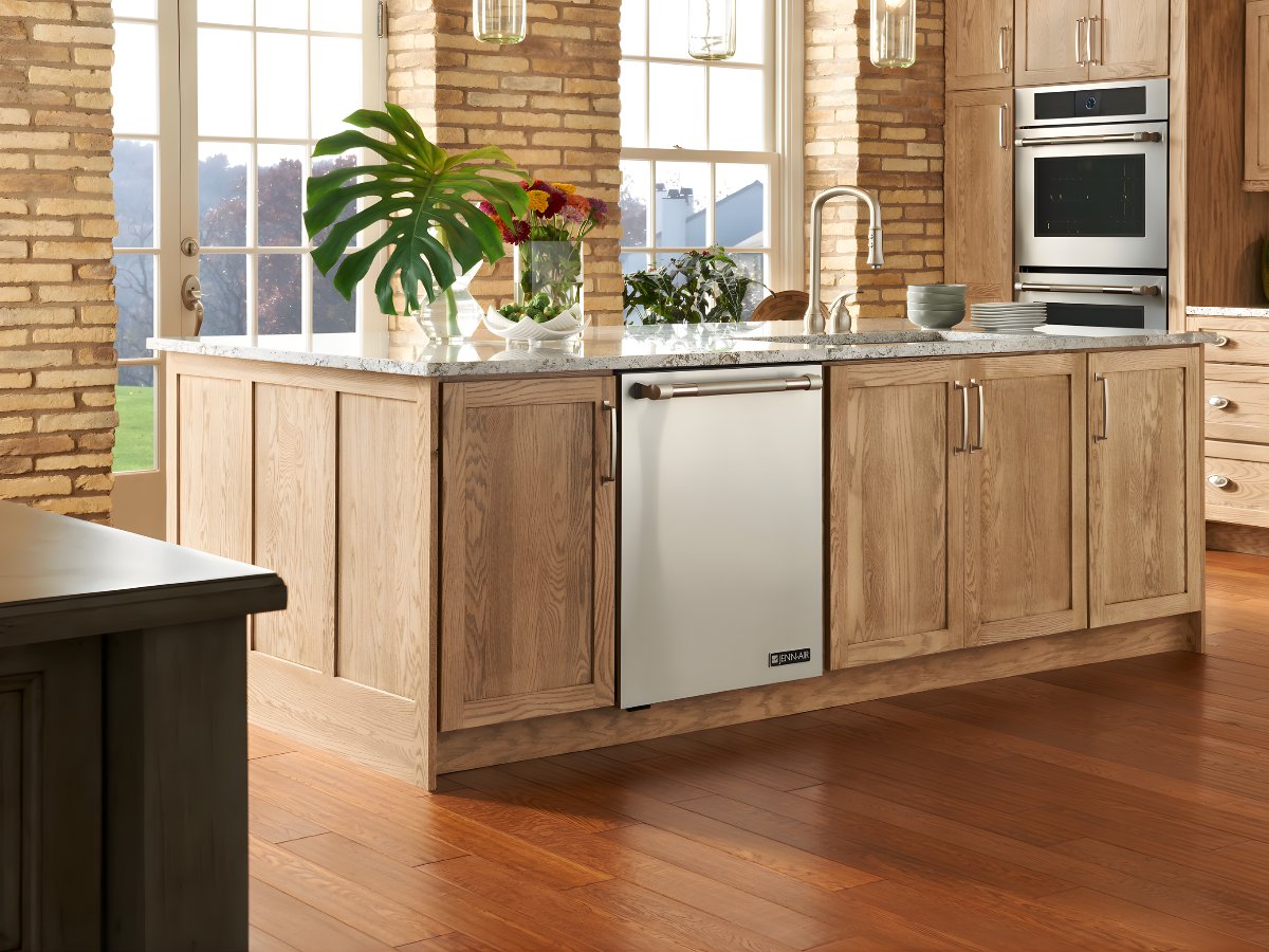 Light wood kitchen island — Advanced Cabinetry Inc.
