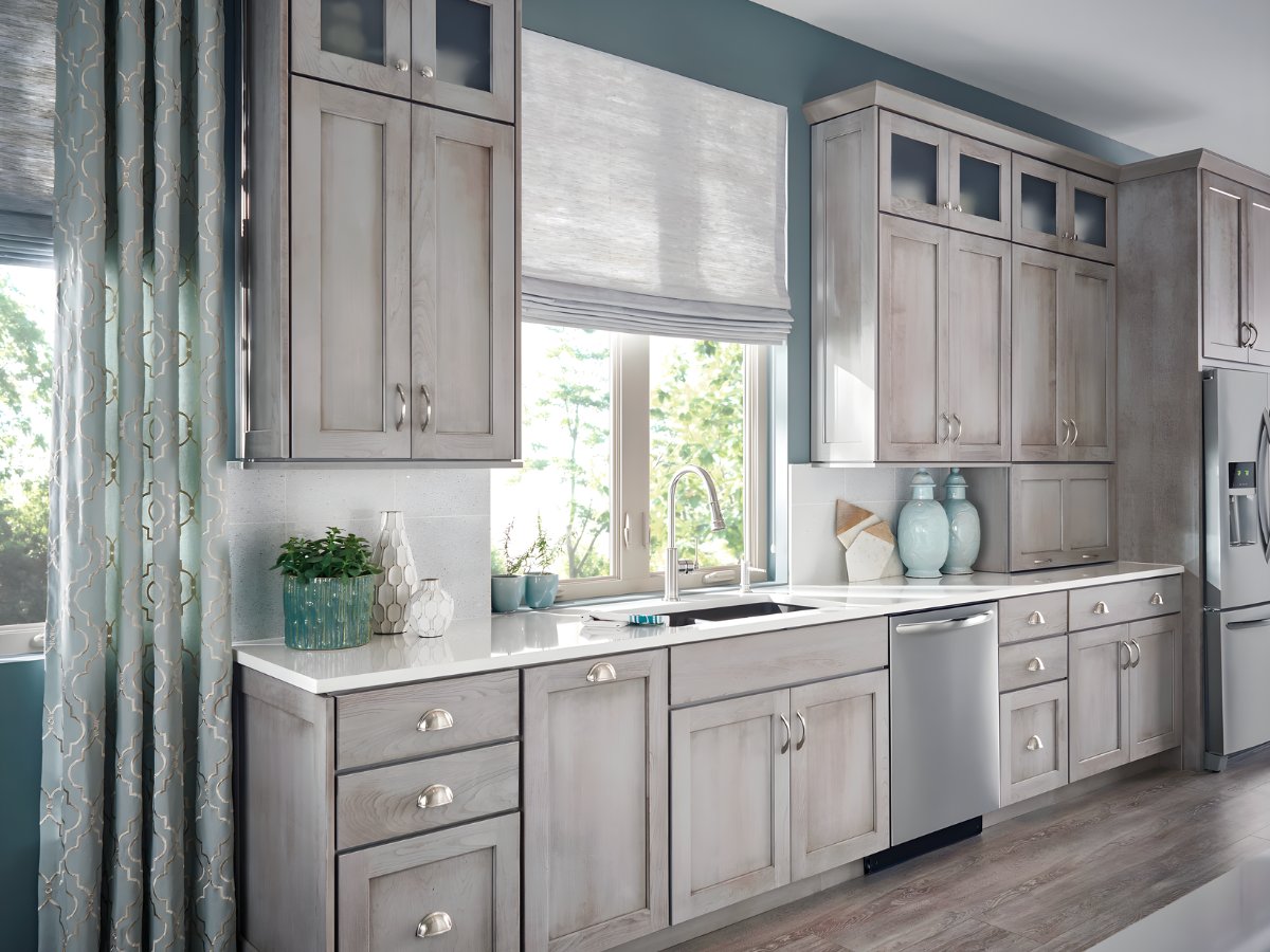 Gray shaker cabinets with teal walls — Advanced Cabinetry Inc.